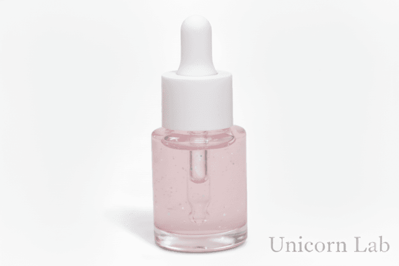 Glass 15ml dropper bottle on a white background