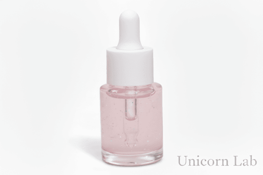 Glass 15ml dropper bottle on a white background