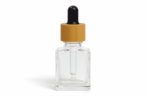 Clear glass 15ml square dropper bottle with wooden cap on a white background