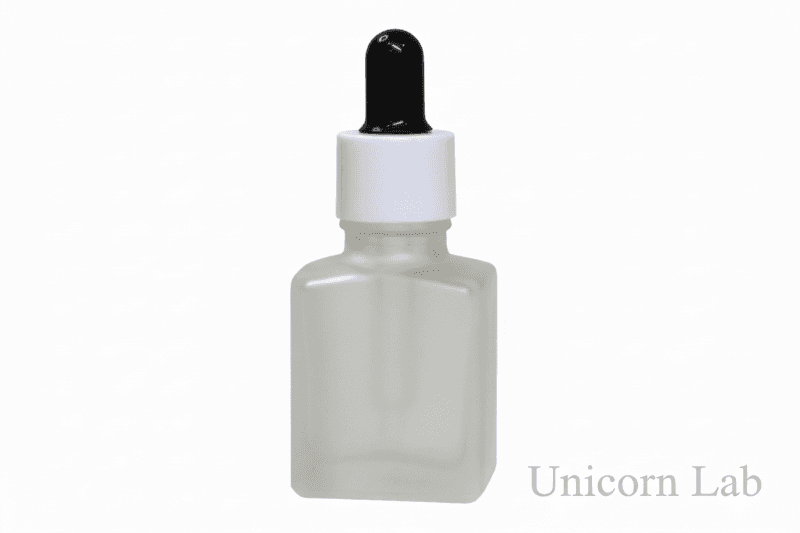 15ml Frosted square dropper bottle with black and white cap on back background for nail serum