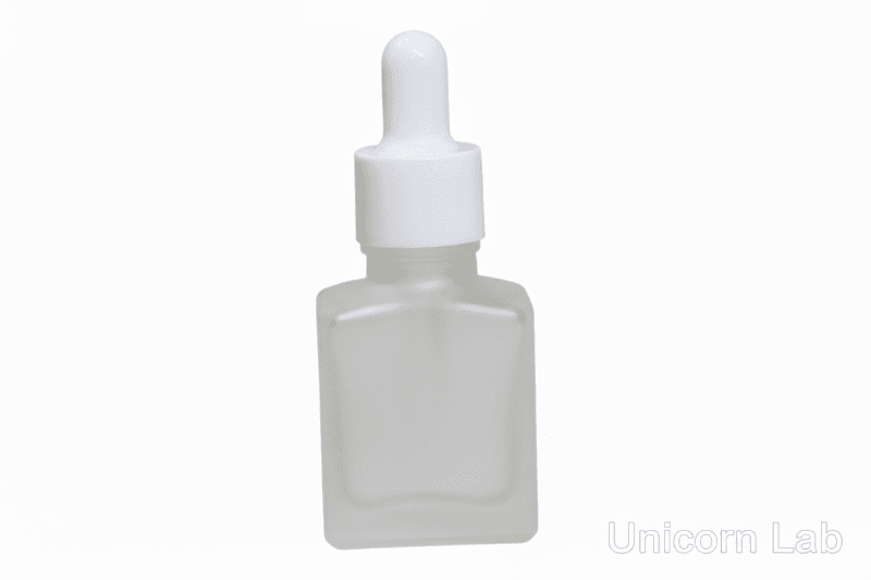 Frosted 15ml square dropper bottle with white cap on a white background