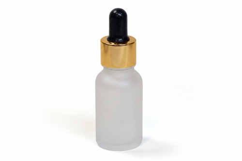 Frosted glass 15ml round dropper bottle with a gold cap on a white background