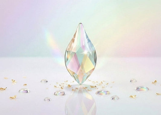 Iridescent crystal pendant on a soft, multicolored background. 2205 Flame AB | Flatback Crystals | 10mm Swarovski Fancy Shape
