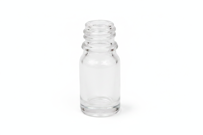Clear glass bottle on a white background