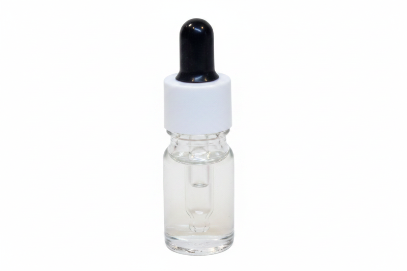 Clear glass 5ml round dropper bottle with a black and white cap on a white background