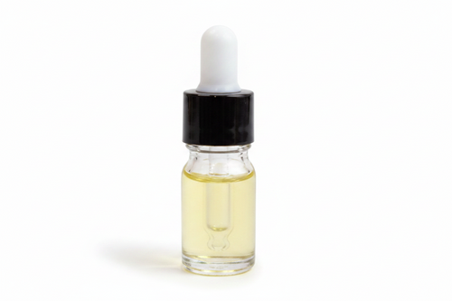 Clear glass  5ml round dropper bottle with black cap on a white background