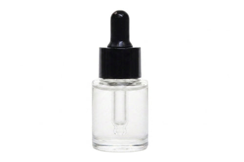 A small clear glass dropper bottle with a black rubber bulb and black cap, shown on a plain white background.