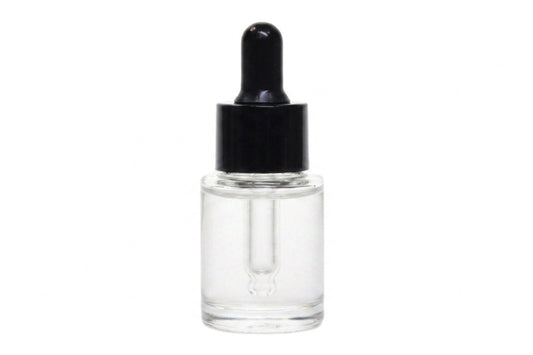 A small clear glass dropper bottle with a black rubber bulb and black cap, shown on a plain white background.