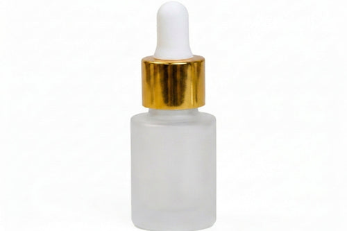 A frosted glass dropper bottle with a white rubber bulb and a shiny gold collar, shown on a plain white background.