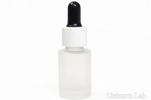 A frosted glass dropper bottle with a white collar and a black rubber-and-plastic dropper top, shown on a plain white background. A faint 'Unicorn Lab' watermark is visible in the bottom right corner.