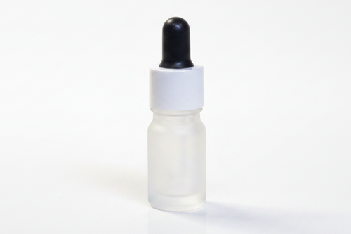 Frosted 5ml round dropper bottle with a black cap on a white background