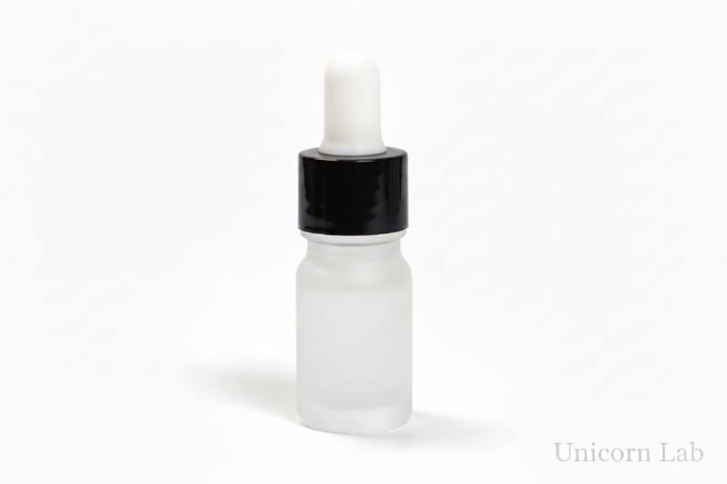 Frosted glass 5ml round dropper bottle with a white cap on a white background