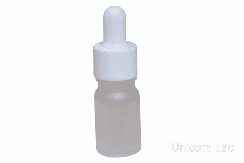 Frosted 5ml round dropper bottle with white cap on a white background