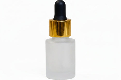 A frosted glass dropper bottle with a shiny gold collar and a black rubber bulb, shown on a plain white background.