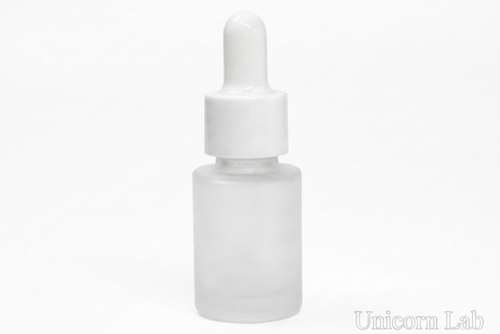 A frosted glass dropper bottle with a white cap and bulb, shown on a plain white background with a faint 'Unicorn Lab' watermark in the bottom right corner.
