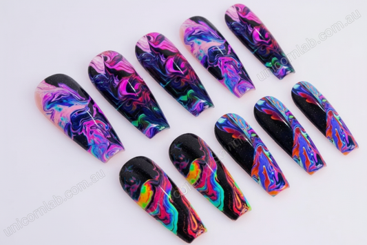 Acid Marble waterslide nail art decal displayed on stiletto nails - Unicorn Lab