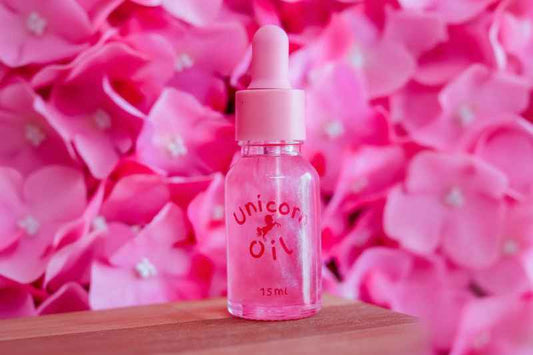 Cherry blossom cuticle oil dropper with clean floral styling, hydrating nail serum