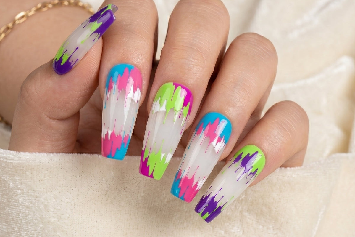Nails with colorful abstract design on a neutral background