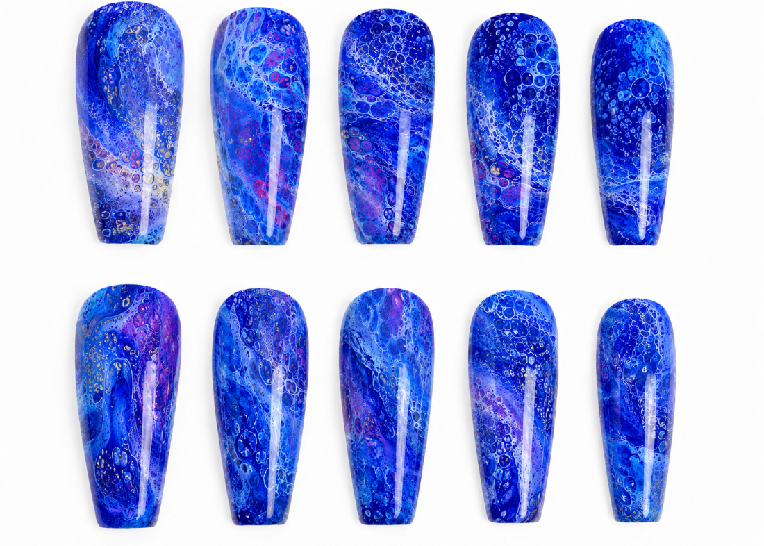 Set of blue marbled nail art designs on a white background