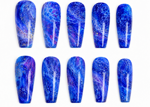 Set of blue marbled nail art designs on a white background