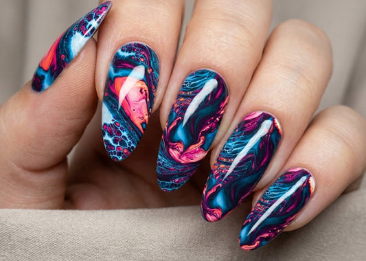 Hand with colorful marble nail art on a neutral background