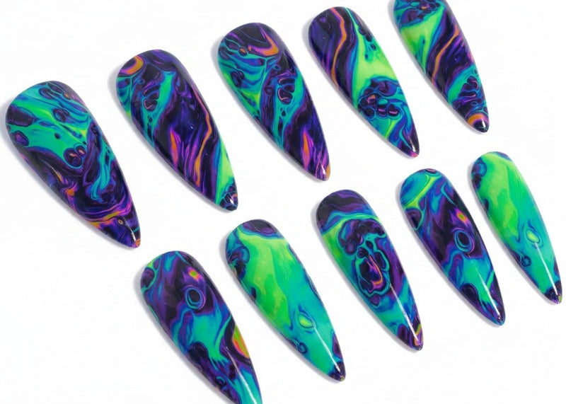 Set of colorful nail art designs on a white background
