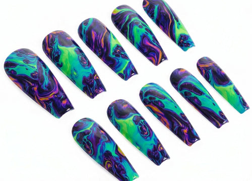 Set of colorful nail art designs on a white background