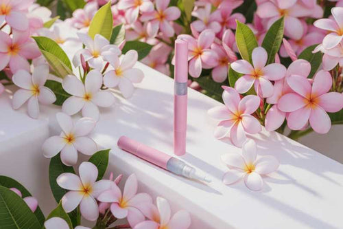 Frangipani cuticle oil dropper with botanical floral styling, hydrating nail serum