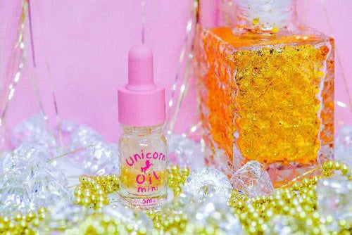 5ml glass bottle of Golden Hour Unicorn Cuticle Oil showcasing a premium nail serum.