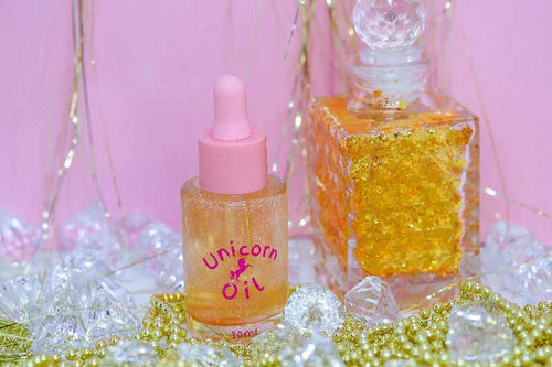 30ml glass bottle of Golden Hour Unicorn Cuticle Oil showcasing a premium nail serum.