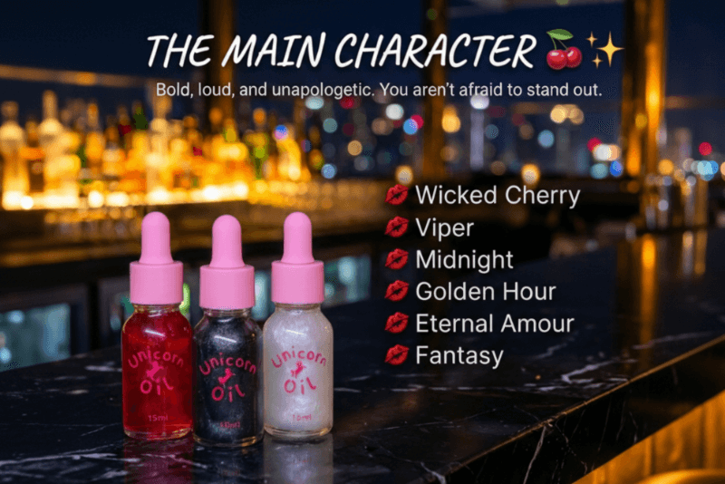 Three bottles of Unicorn Oil with pink caps on a bar counter, featuring text about product names and a cityscape in the background.