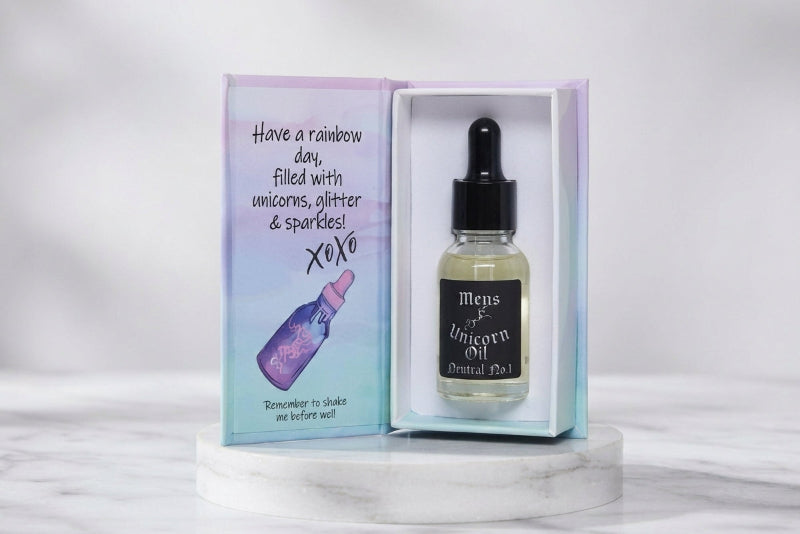 15ml glass bottle of Men's Neutral No.1 Cuticle Oil displayed elegantly inside its magnetic luxury style gift box, showcasing a premium, shimmer-free serum.