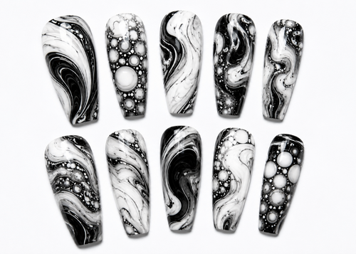 Set of black and white marbled nail art designs on a white background
