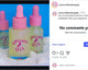 Three bottles of 'Unicorn Oil' with pink droppers on a beach-themed background.
