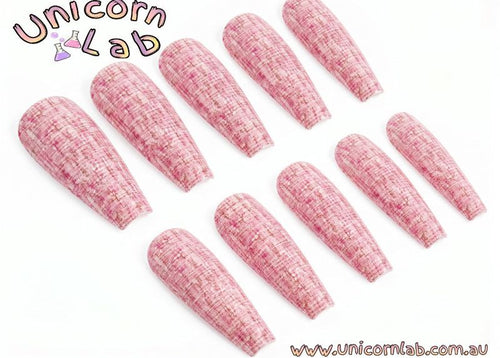 Pink textured nail polish strips with Unicorn Lab branding on a white background. Soft Pink Tweed Waterslide Decals