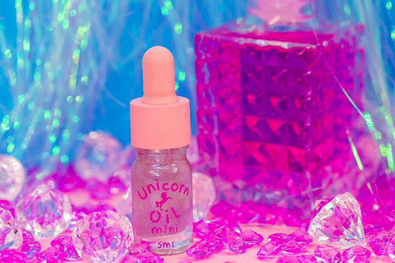 Sweet fantasy scented cuticle oil mini bottle with feminine aesthetic, hydrating nail serum