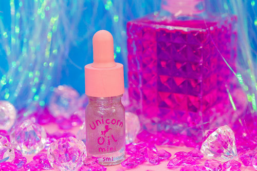 Sweet fantasy scented cuticle oil mini bottle with feminine aesthetic, hydrating nail serum