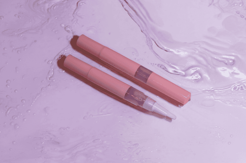 Two Sweet Fantasy shimmer cuticle oil pens in 1ml sample size, Australian made vegan nail serum for nail growth and repair.