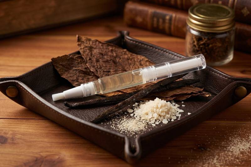 tobacco vanilla scented cuticle oil pen, inspired by the popular fragrance for men.