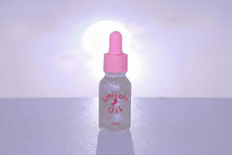 Unicorn oil bottle with pink dropper cap for nail care over a soft lilac background.