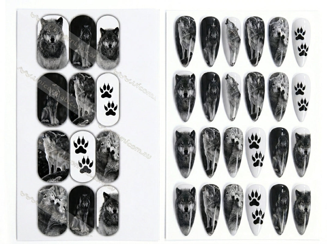 Nail art stickers with wolf and paw design on a white background