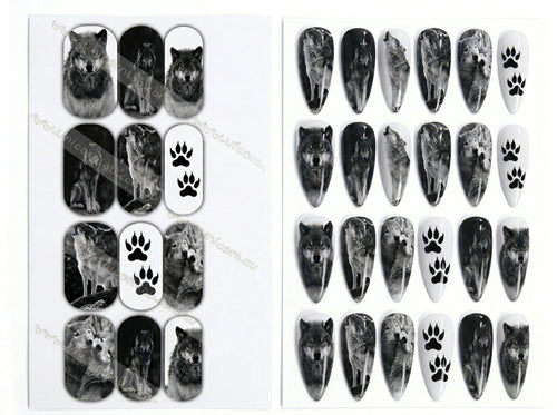 Nail art stickers with wolf and paw design on a white background