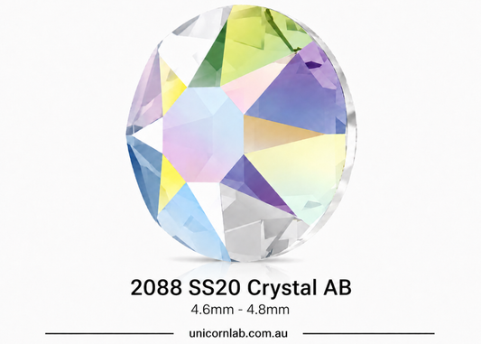 Multicolored crystal with '2088 SS20 Crystal AB' label on a white background. SS20 Crystal AB | Flatback Nail Crystals | Genuine Swarovski 2088 Rhinestones