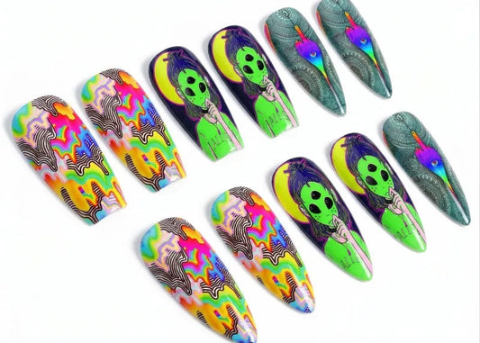 Colorful and patterned nails on a white background