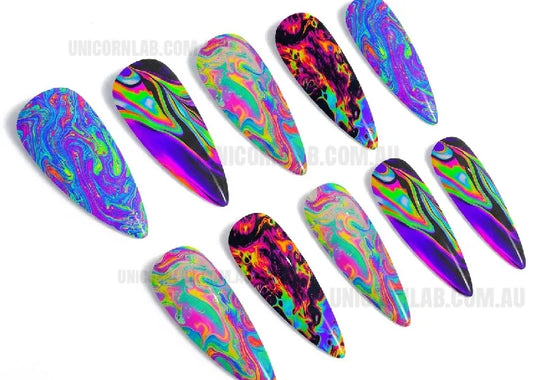 Colorful tie-dye nail art designs on a white background with 'UnicornLab' branding.