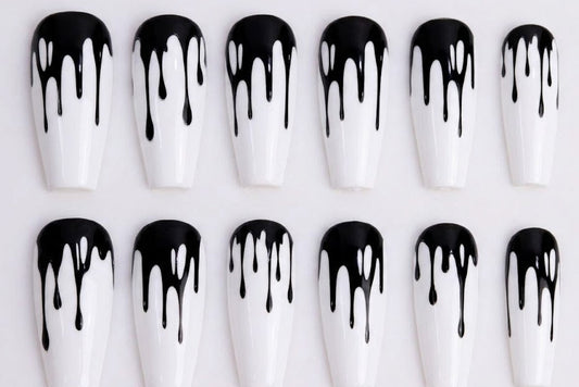 White nails with black drip waterslide decal on a white background - Unicorn Lab