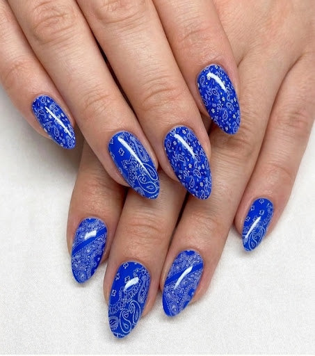 blue bandana waterslide art decal on almond nails - Unicorn Lab