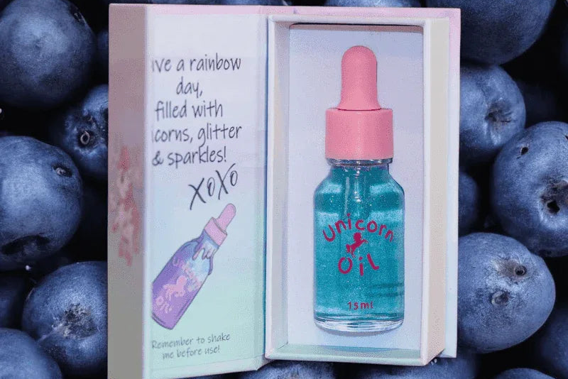 15ml glass dropper bottle of Blueberry Farm Unicorn Cuticle Oil, showcased in luxury style packaging