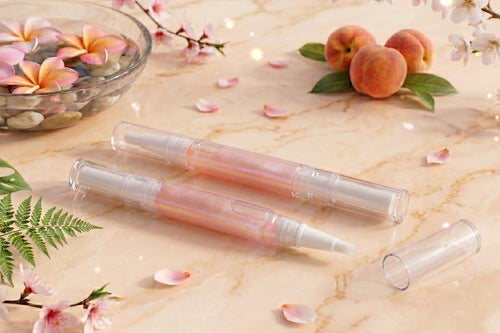 3ml twist clear cuticle oil pen of Tropical Peach Blossom Unicorn Cuticle Oil featuring a shimmering golden-peach liquid.