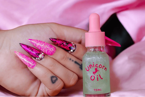 15ml dropper bottle luxury French Pear Unicorn Cuticle Oil serum for professional salons. with pink gliter nails on pink background